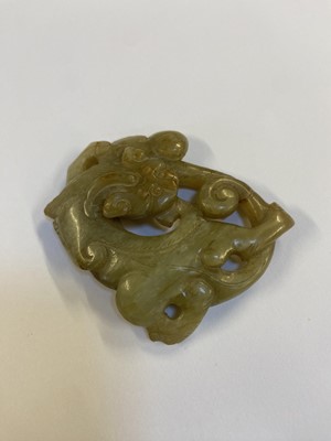 Lot 485 - Jade. A Chinese jade pebble, carved as a bird plus a chilong