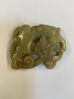 Lot 485 - Jade. A Chinese jade pebble, carved as a bird plus a chilong