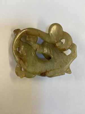 Lot 485 - Jade. A Chinese jade pebble, carved as a bird plus a chilong