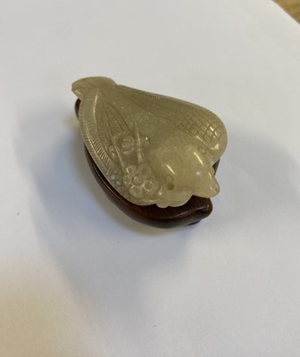 Lot 485 - Jade. A Chinese jade pebble, carved as a bird plus a chilong