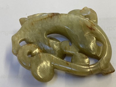 Lot 485 - Jade. A Chinese jade pebble, carved as a bird plus a chilong