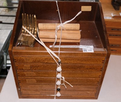 Lot 219 - Type and type cabinet. Six sets of brass Camberwell type