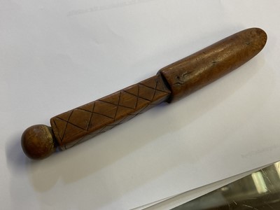 Lot 457 - Treen. A 17th century treen apple corer dated 1696