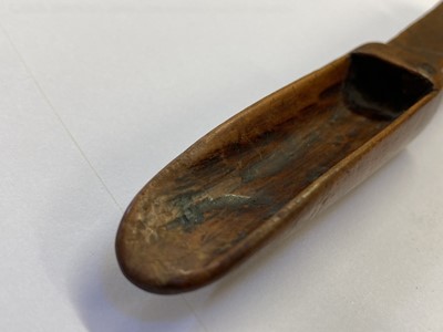 Lot 457 - Treen. A 17th century treen apple corer dated 1696