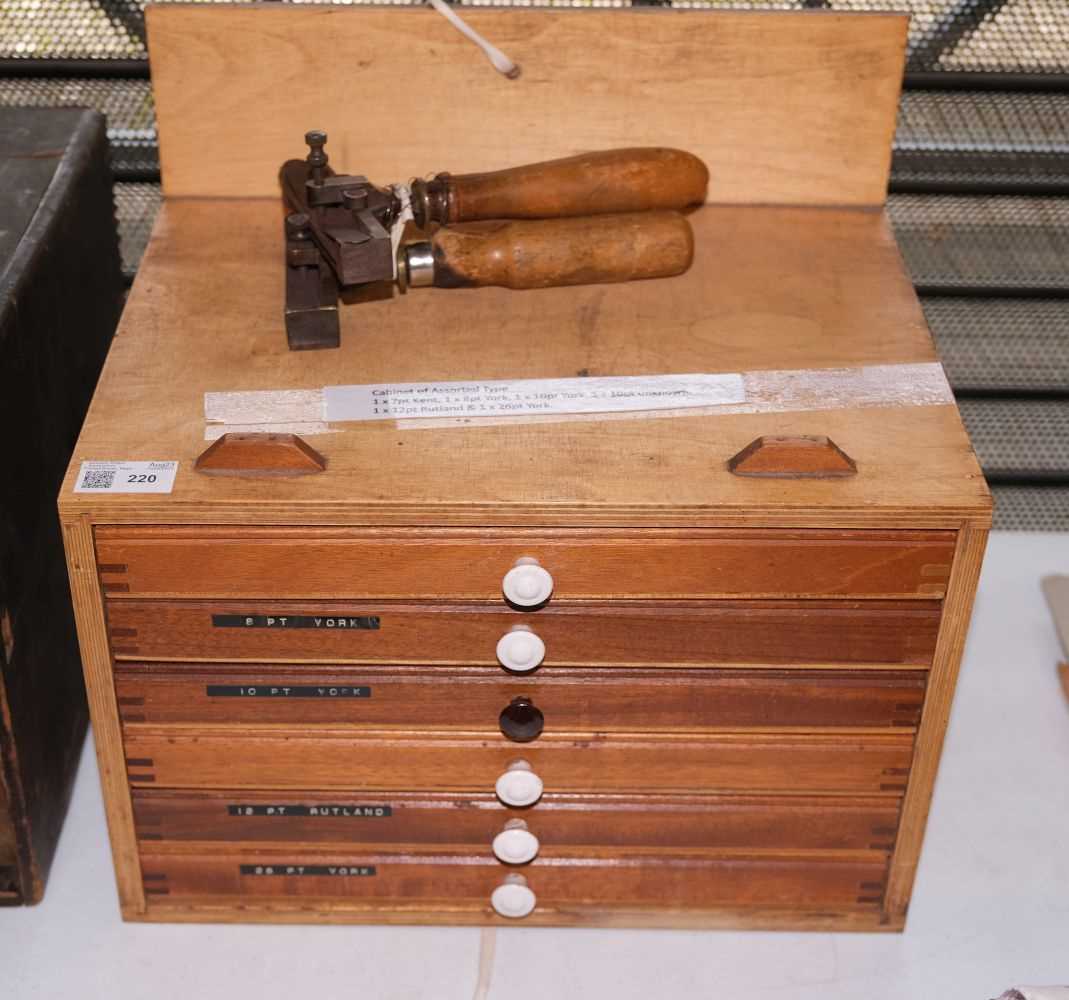 Lot 220 - Type and type cabinet. Six sets of brass type