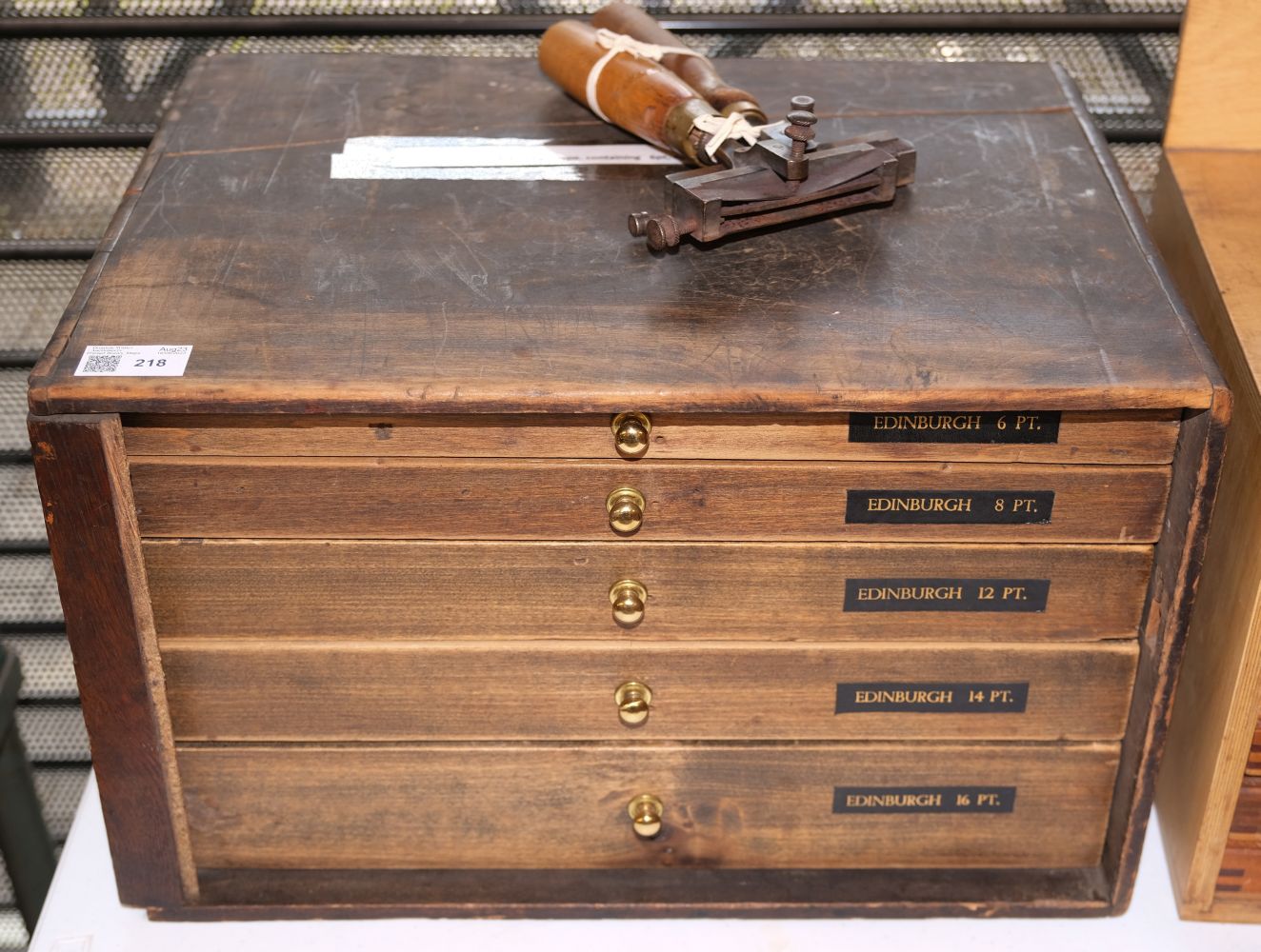 Lot 218 - Type and type cabinet. Five sets of brass