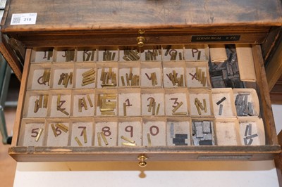Lot 218 - Type and type cabinet. Five sets of brass type