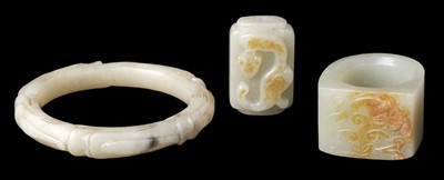 Lot 478 - Jade. A Chinese jade archers ring, bangle and toggle