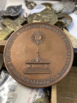 Lot 450 - Religious Artefacts. A Victorian yellow metal cross and religious medals