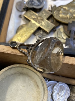 Lot 450 - Religious Artefacts. A Victorian yellow metal cross and religious medals