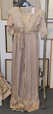 Lot 631 - Clothing. A silk Edwardian day dress, circa 1915, & other dresses