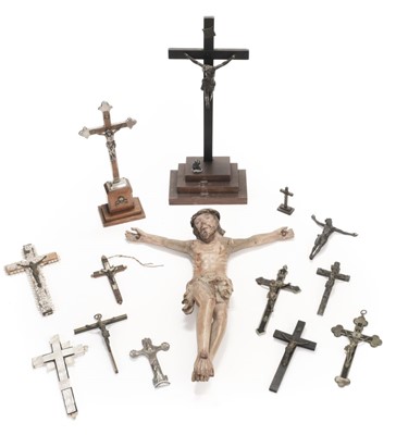Lot 441 - Crucifixes. A collection of crucifixes including a 19th century carved wood figure of Christ
