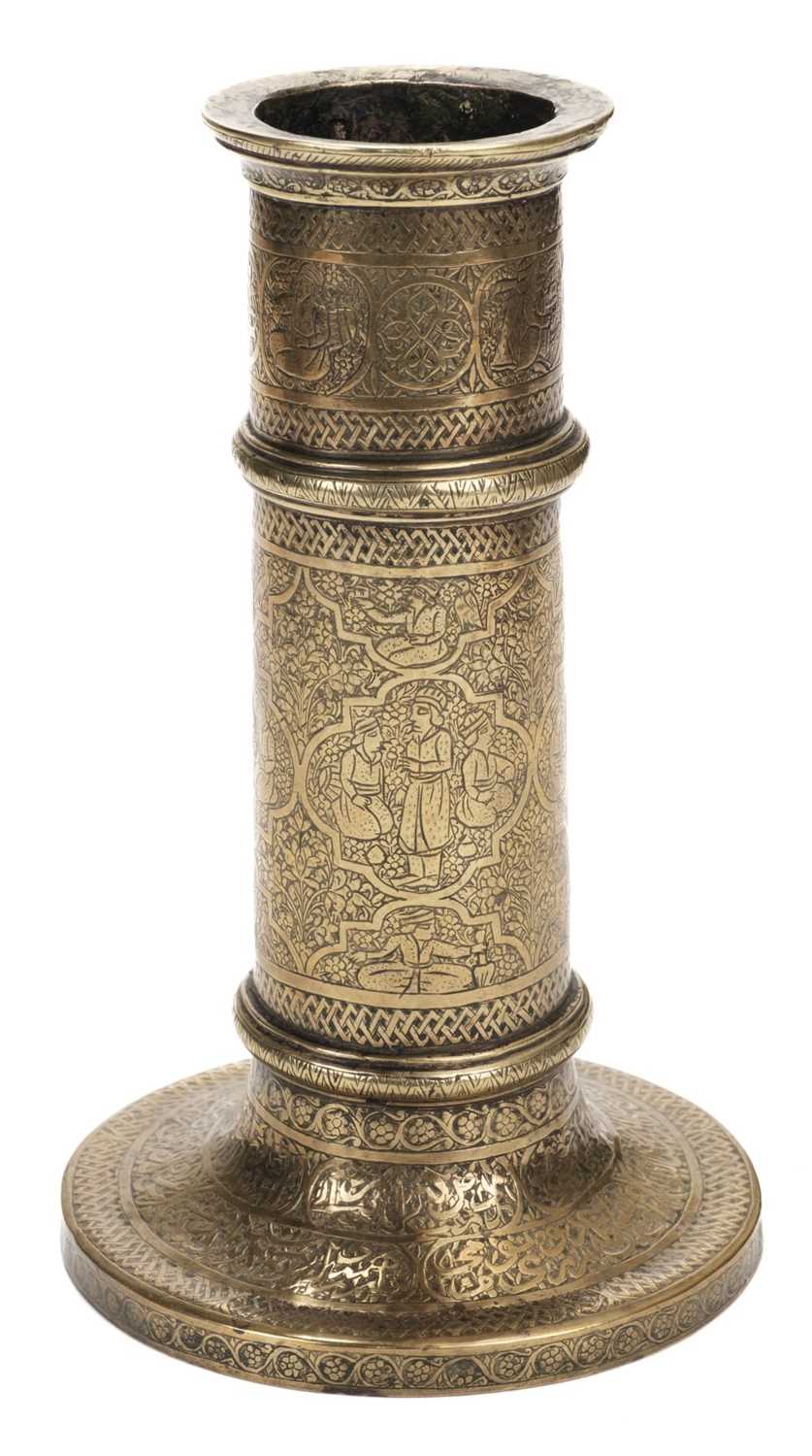 Lot 332 - Candlestick. A Persian brass candlestick, Qajar period (1789-1925)