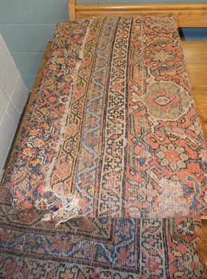 Lot 627 - Carpet. An early 20th century Middle Eastern woollen carpet