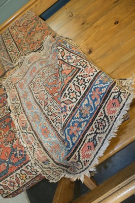 Lot 627 - Carpet. An early 20th century Middle Eastern woollen carpet