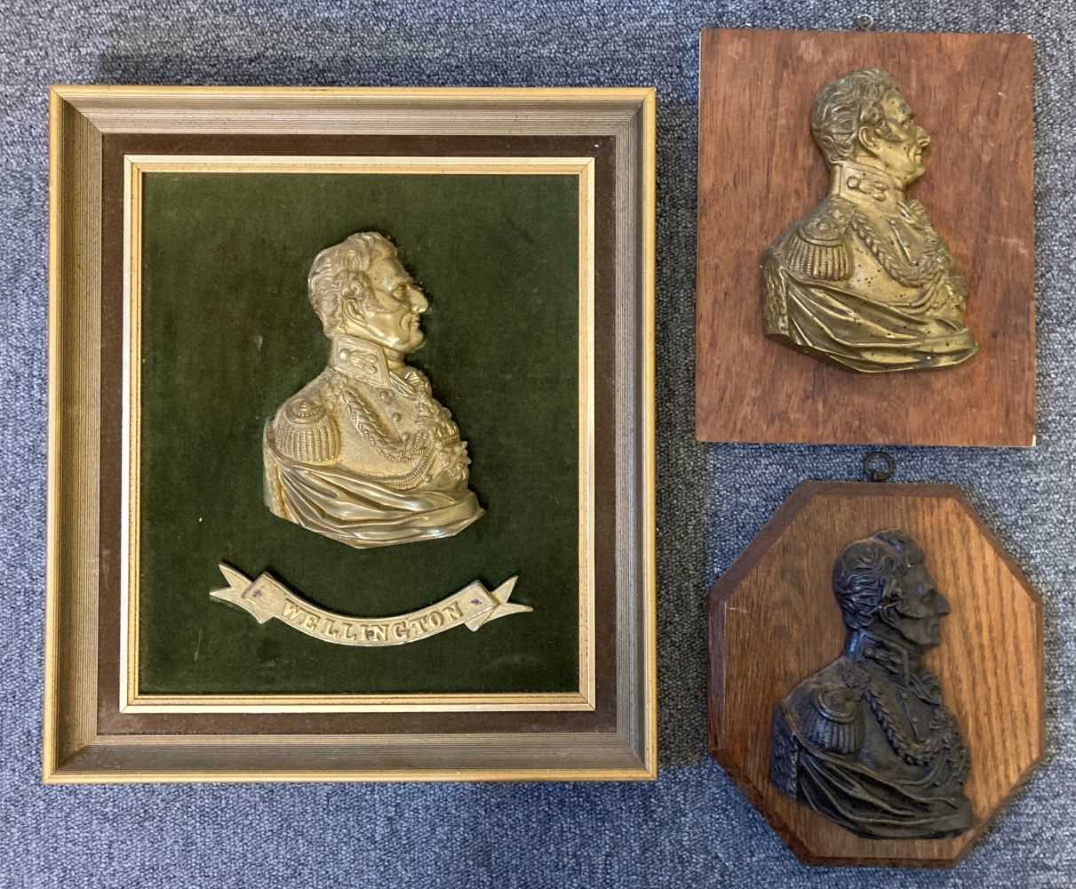 Lot 542 - Duke of Wellington. A group of three bronze gilded reliefs of the Duke of Wellington