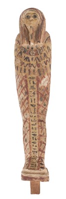 Lot 464 - Ancient Egypt. A large Egyptian carved wood shabti