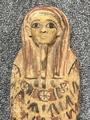 Lot 464 - Ancient Egypt. A large Egyptian carved wood shabti