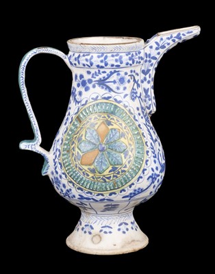 Lot 498 - Jug. A 19th century Turkish pottery Kutahya jug
