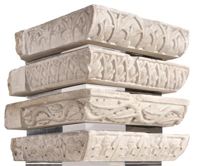 Lot 395 - Gill (Eric, 1882-1942). Four Cushion Capitals, carved Hoptonwood stone, circa 1921