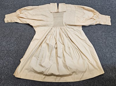 Lot 407 - Clothing. A prize-winning traditional shepherd's smock, circa 1960, & other items