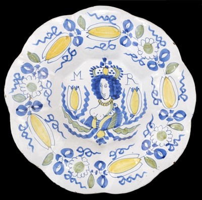 Lot 344 - Dutch Delft. A rare Mary II delft charger circa 1690