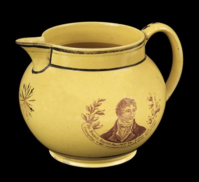 Lot 358 - Sir Francis Burdett. A George III period canary yellow pottery commemorative jug