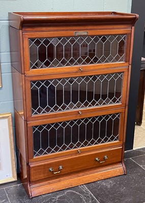 Lot 222 - Bookcases. A pair of mahogany bookcases by Gunn circa 1920