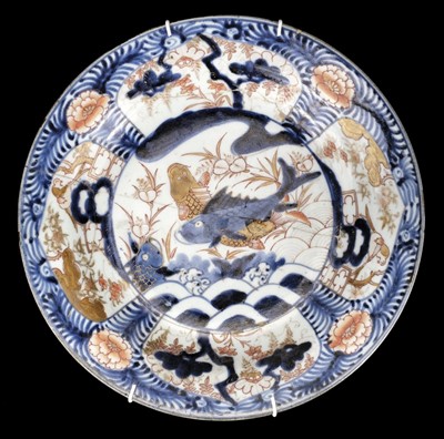 Lot 112 - Plates. Japanese porcelain plates, comprising an 18th century Nabeshima black and white plate