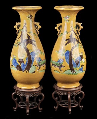 Lot 1 - Vases. A pair of large Chinese earthenware vases, late Qing (second half 19th century)