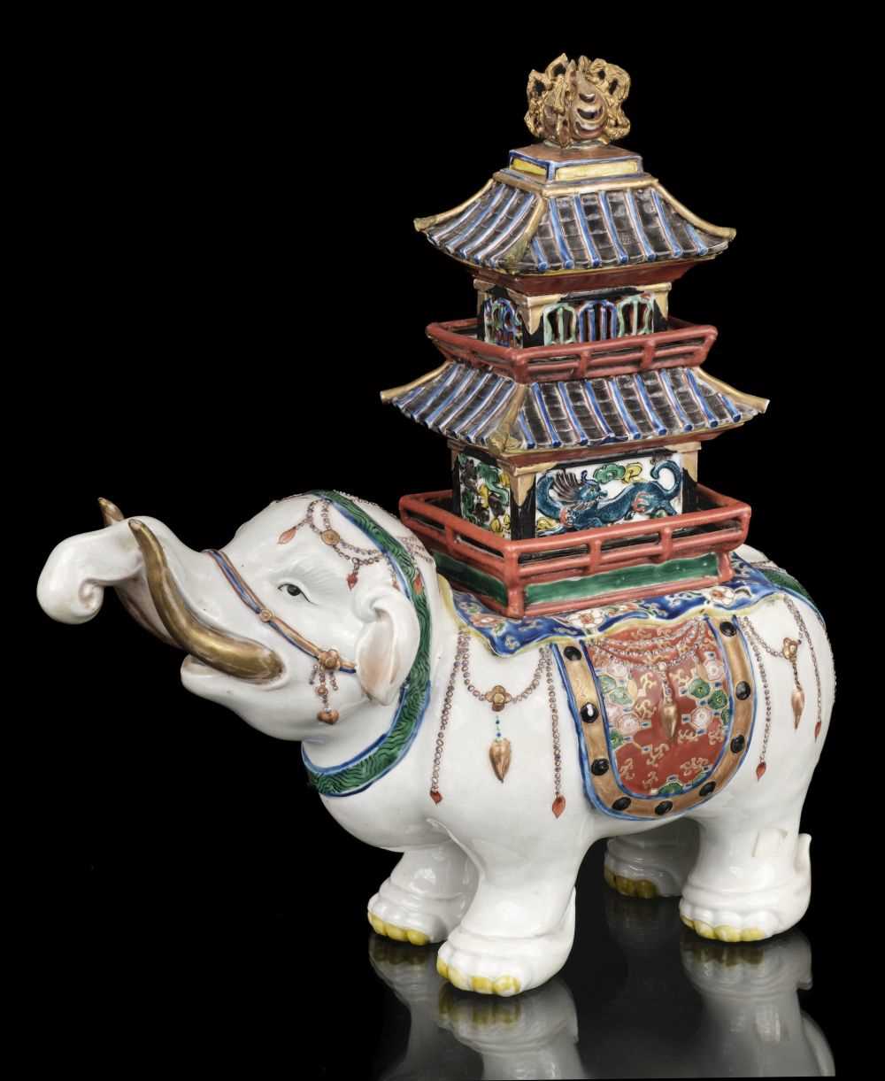 Lot 144 - Elephant. Japanese porcelain elephant. Meiji period (1868-1912)