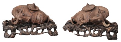 Lot 178 - Water Buffaloes. Pair of early 20th century Chinese carved wood water buffaloes