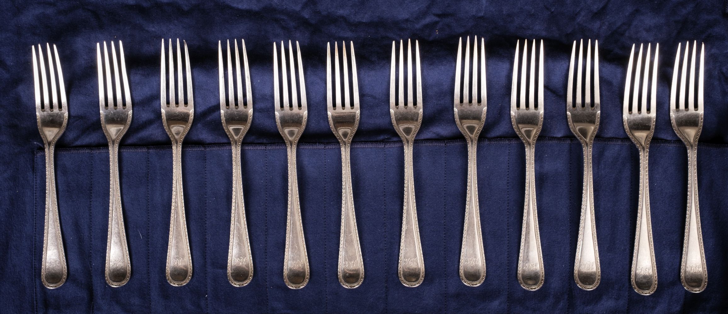Lot 275 - Silverware. A sterling silver part set of