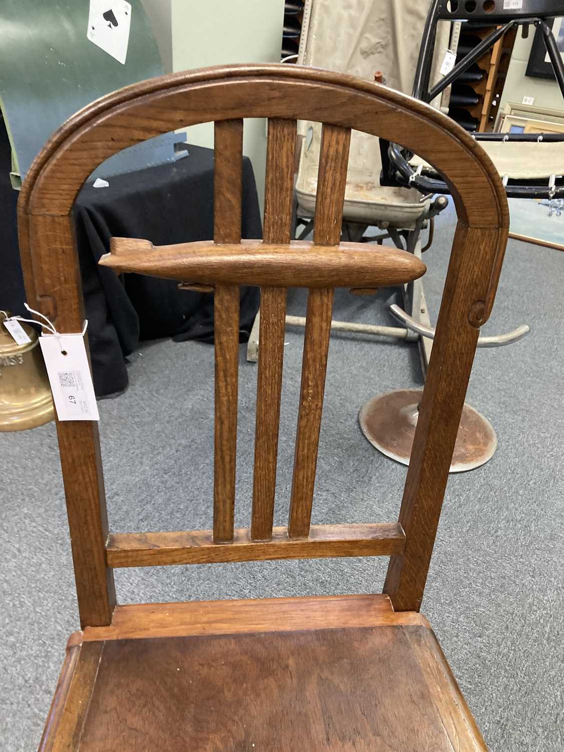 Lot 67 - Airship Chair. An art deco oak airship chair,