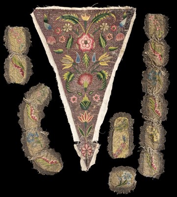 Lot 416 - Embroidered stomacher. A stomacher & trims for a dress, English, circa 1700