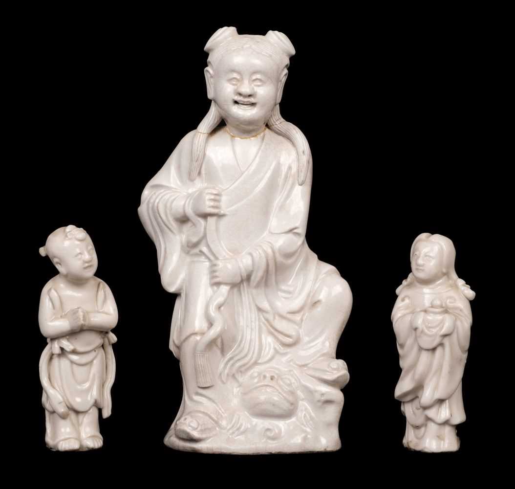 Lot 28 - Chinese Figures. 18th century Chinese white glazed porcelain figure of Liu Haichan, and two others