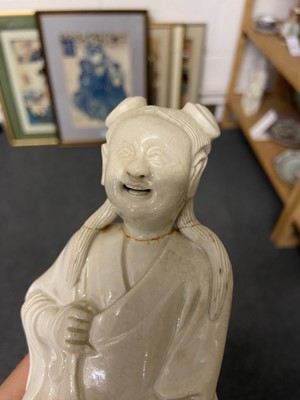 Lot 28 - Chinese Figures. 18th century Chinese white glazed porcelain figure of Liu Haichan, and two others