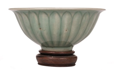 Lot 311 - Bowl. A Chinese celadon 'lotus' bowl, probably Ming Dynasty