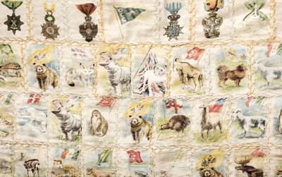 Lot 448 - Tobacco silks. A large tablecloth of stitched cigarette silks, early 20th century