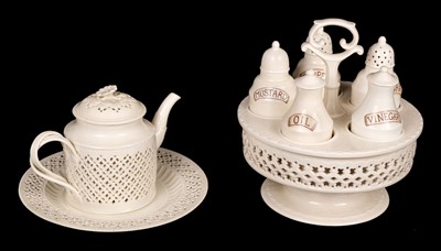 Lot 351 - Leeds Pottery. A large Leeds creamware cruet set