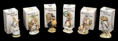 Lot 612 - Beswick. A group of Beatrix Potter pottery figures, each with Beswick brown line