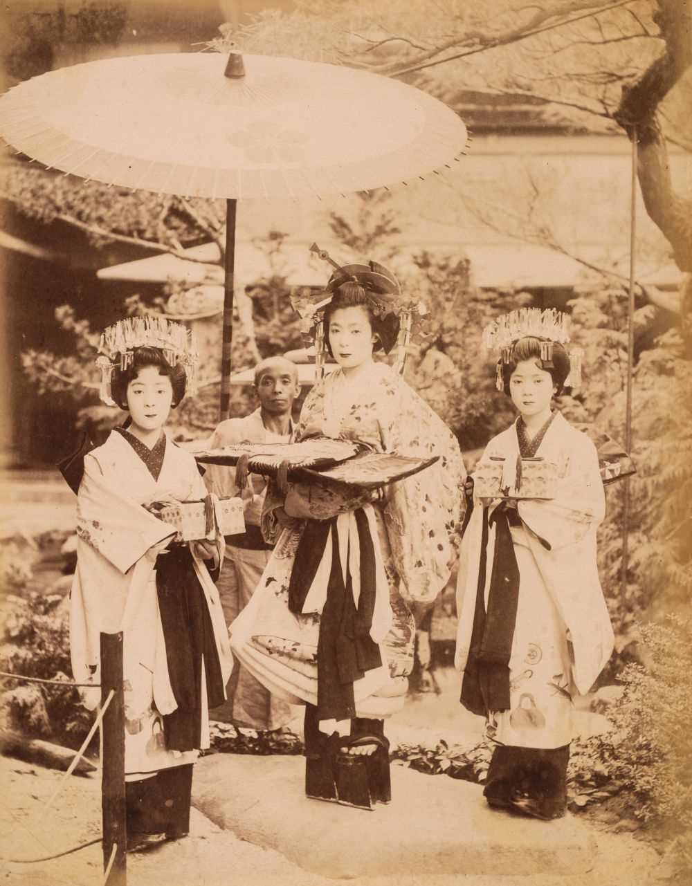 Lot 46 - Japan. A group of 62 mainly hand-coloured albumen prints of Japanese views and people, c. 1880s