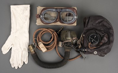 Lot 173 - Aviation Apparel. WWII RAF-issue flying helmet, goggles and mask ensemble, circa 1940s