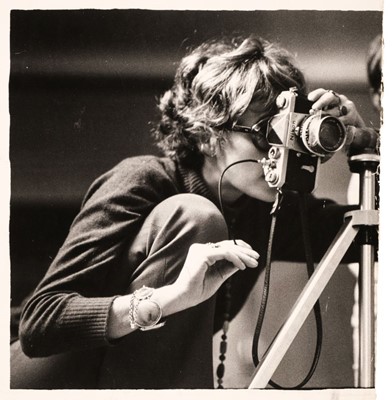 Lot 178 - Moon (Sarah, b. 1941). Sarah Moon with her camera by an unidentified photographer, [?]Paris, 1969