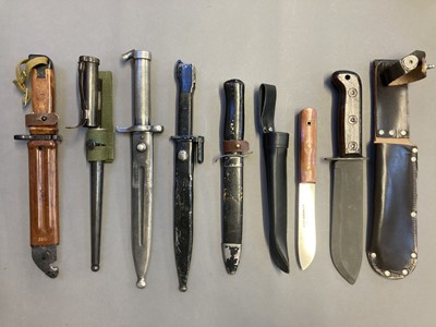 Lot 336 - Knives. A military survival knife and other knives