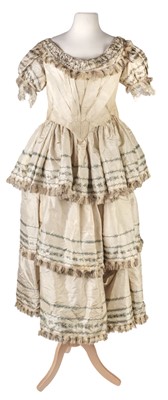 Lot 684 - Clothing. A mid 19th century silk bodice and matching skirt, & 2 ostrich feather fans