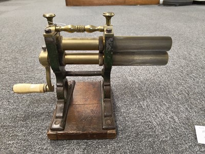 Lot 748 - Lace Crimping Iron. A goffering machine, mid 19th century, & a Thread Tester, late 19th century