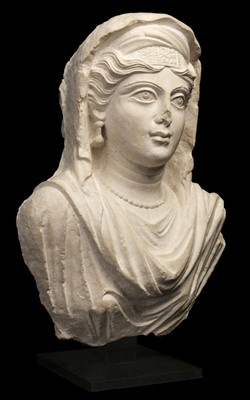 Lot 555 - Palmyrene Empire. A limestone bust of a female, mid-2nd century A.D.