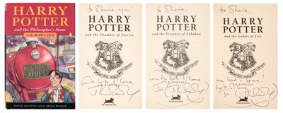 Lot 895 - Rowling (J. K.). A complete set of the Harry Potter books, all inscribed by the author, 7 volumes, 1998-2010 plus 6 other signed items