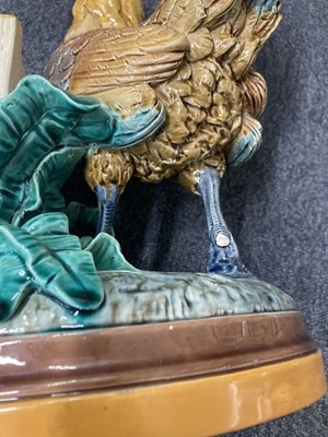 Lot 501 - Majolica. A Victorian Minton majolica spill vase modelled as a hen by John Henk